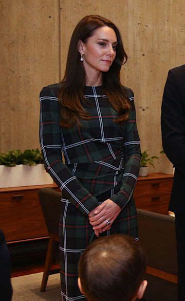 Princess Kate is a vision in tartan Burberry bodycon.